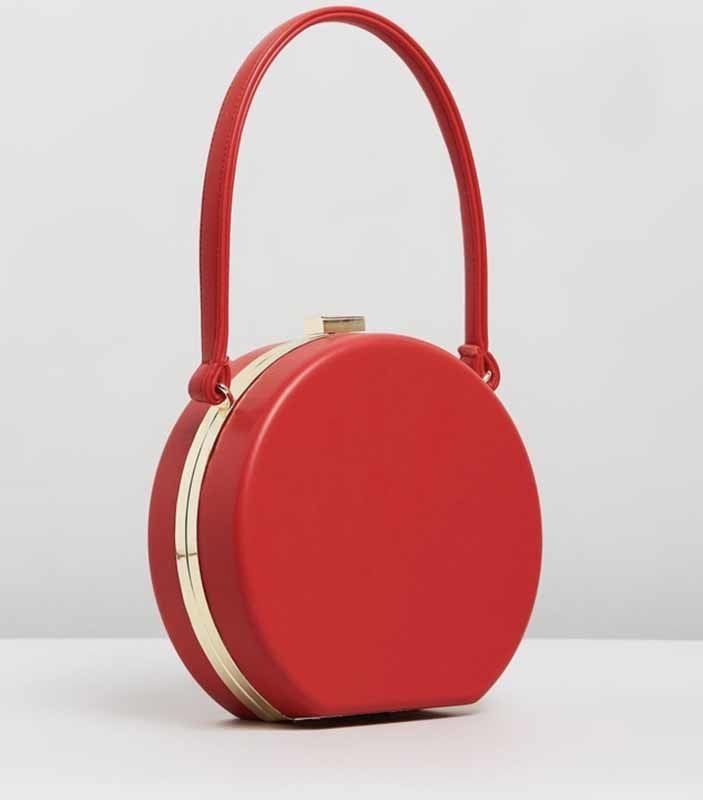 circular red hand bag