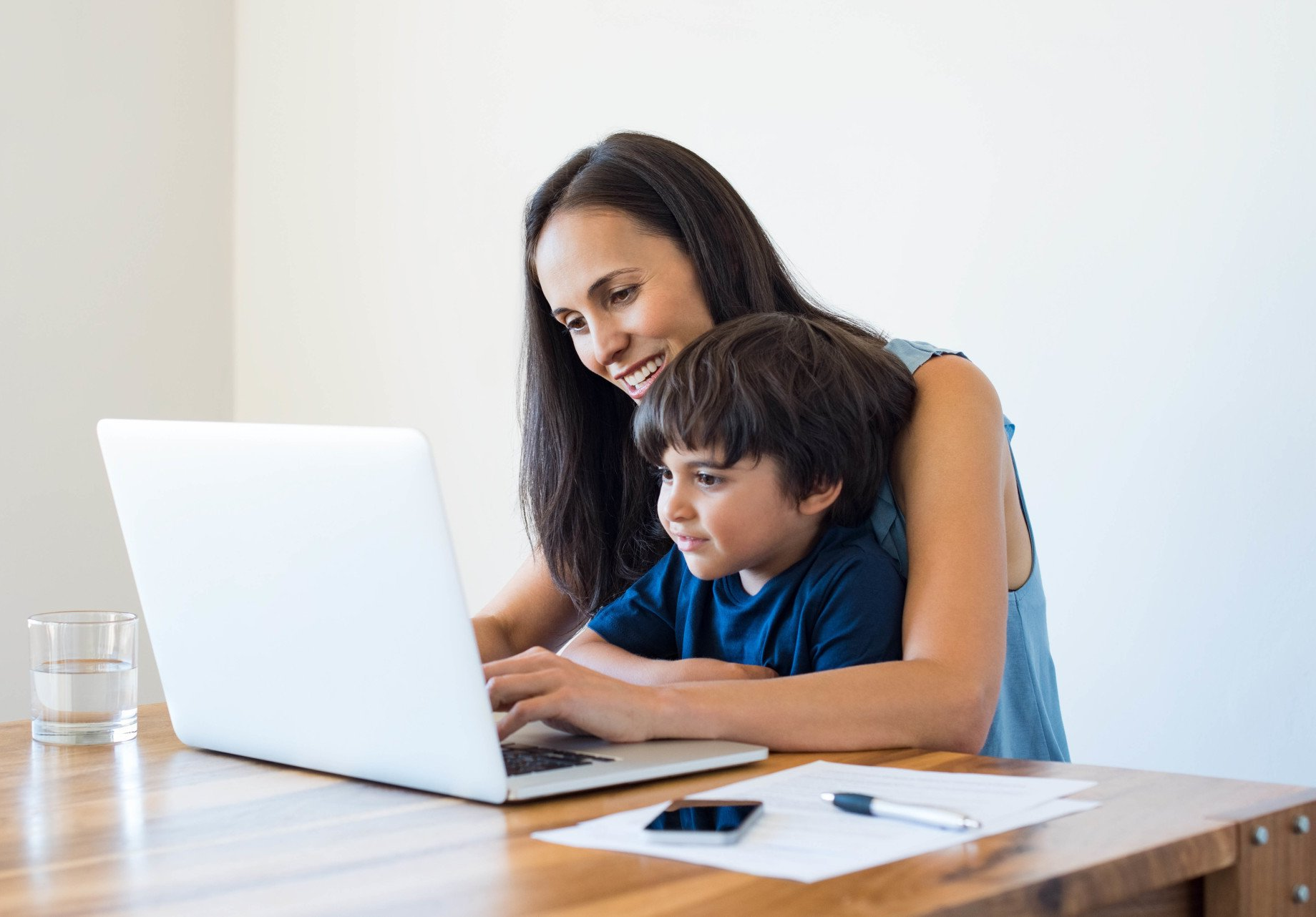 mother and young son have tele-neurology video visit