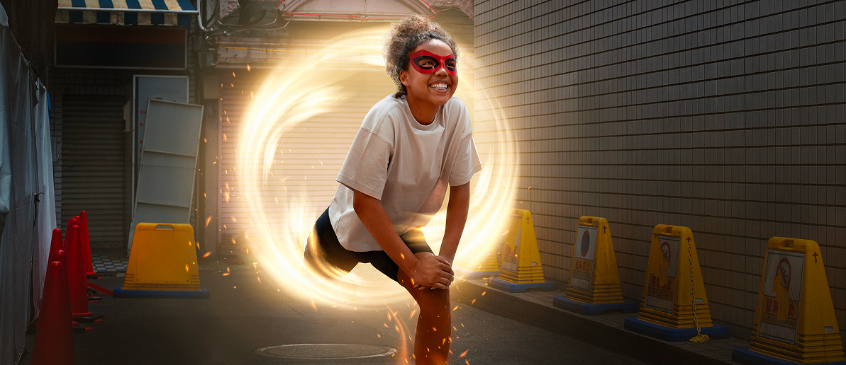 Woman's finger pointing towards a screen with floating headshots of various people.