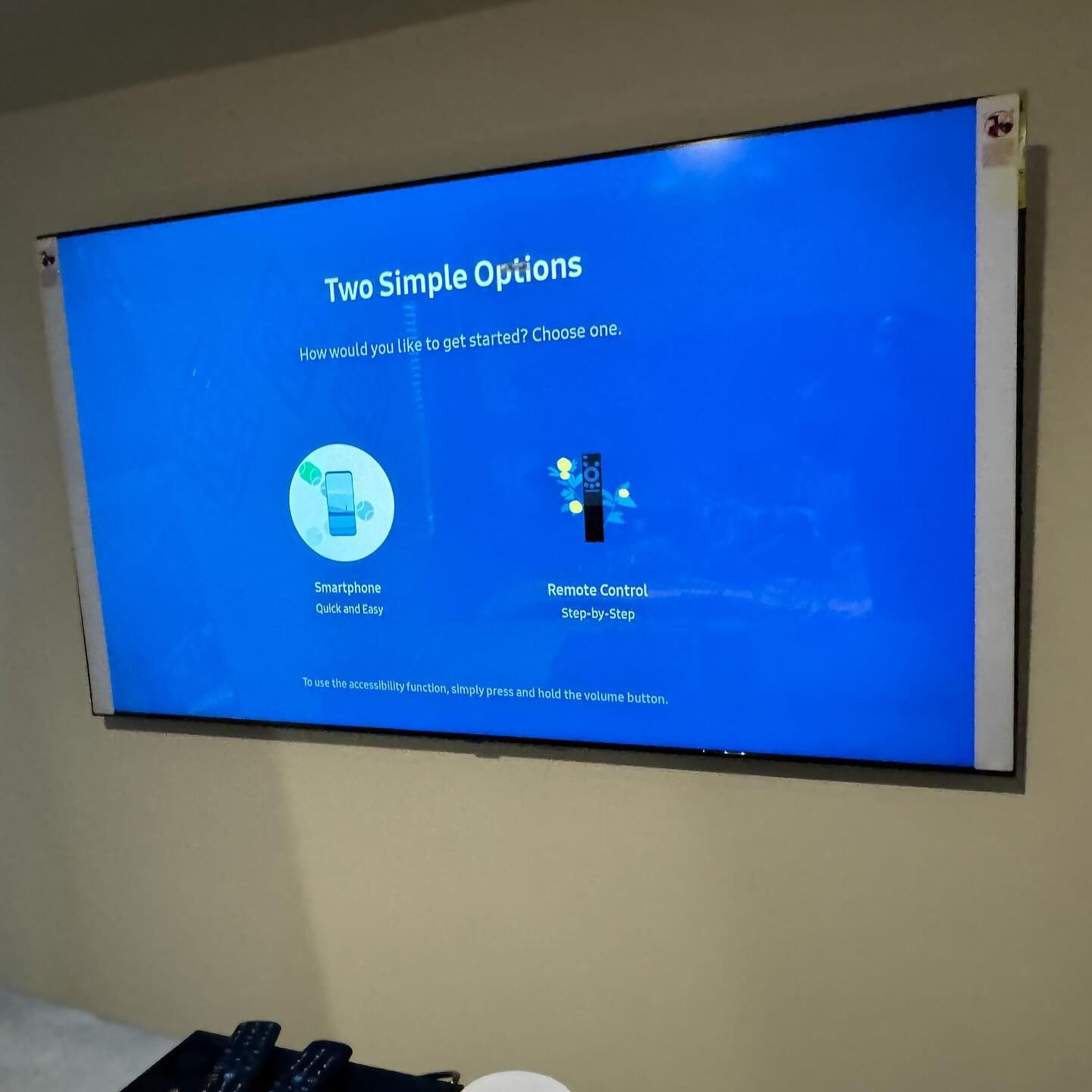 A flat screen tv is displaying two simple options