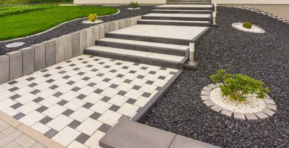 Front garden with external staircase made of prefabricated concrete parts concrete paving  — D-Scapes Landscaping Services Pty Ltd in Pacific Palms, NSW