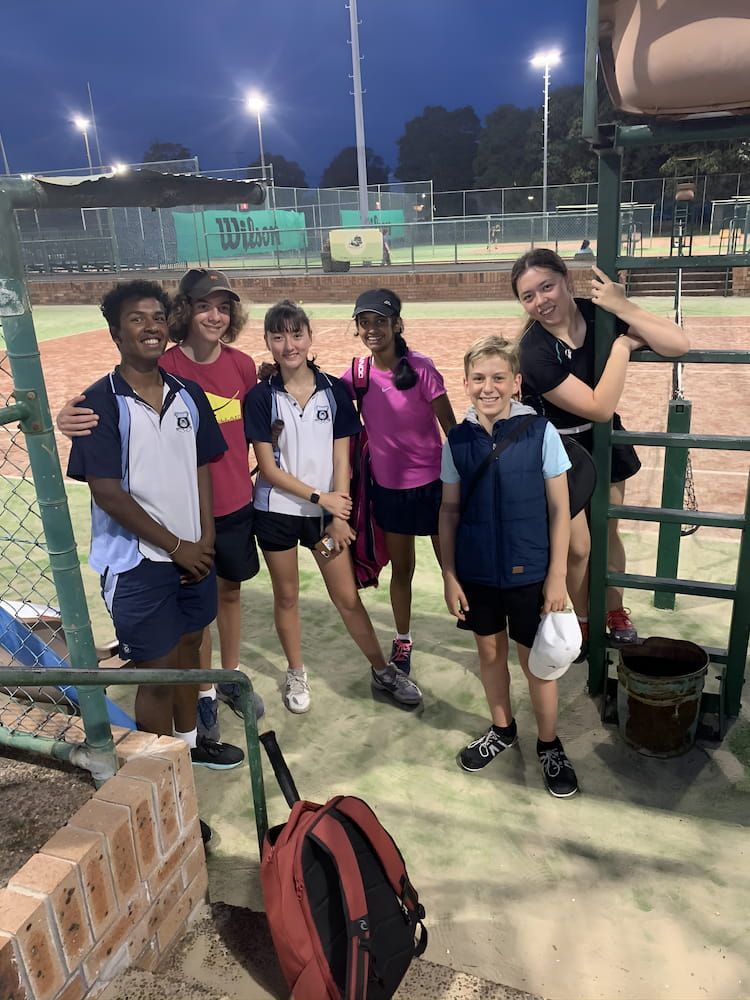 A Group of Young People Are Posing for a Picture on a Tennis Court — Topspin Tennis Newcastle in Lambton, NSW