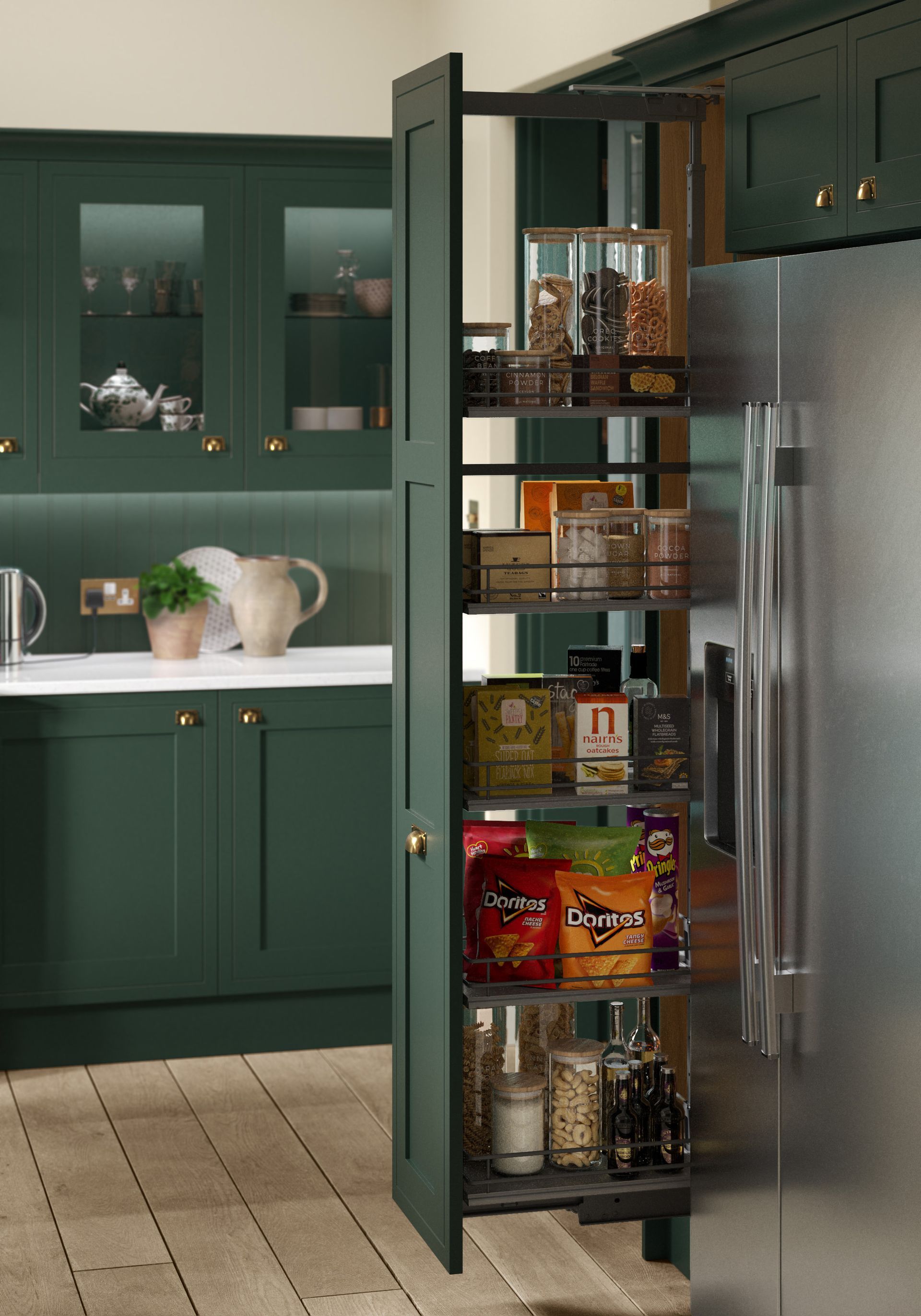 Green kitchen with open pull-out pantry beside a stainless steel refrigerator