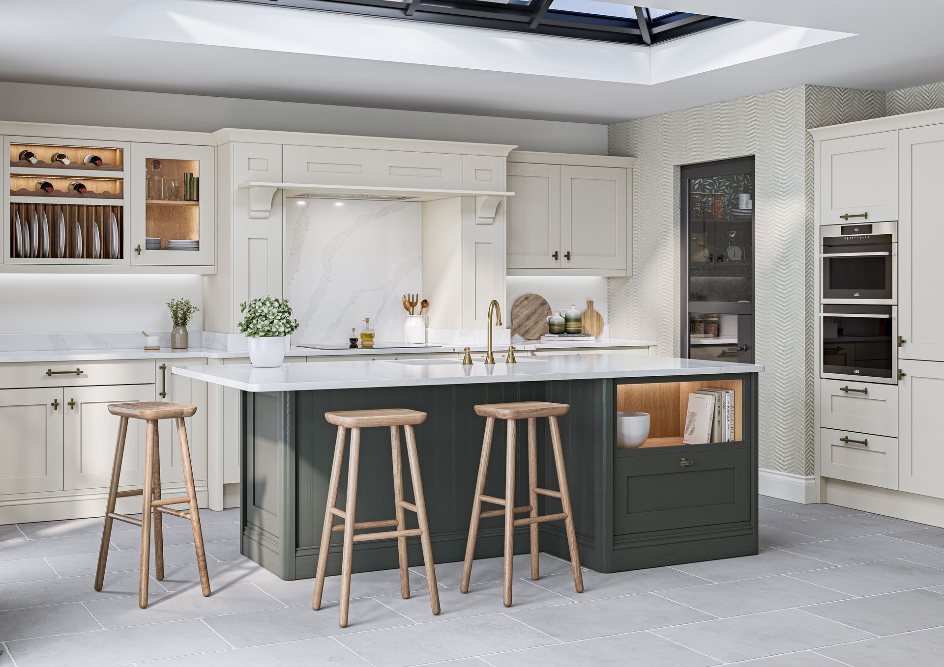 Modern open-plan kitchen and dining area with cream cabinetry, a central island, and a circular wooden dining table.