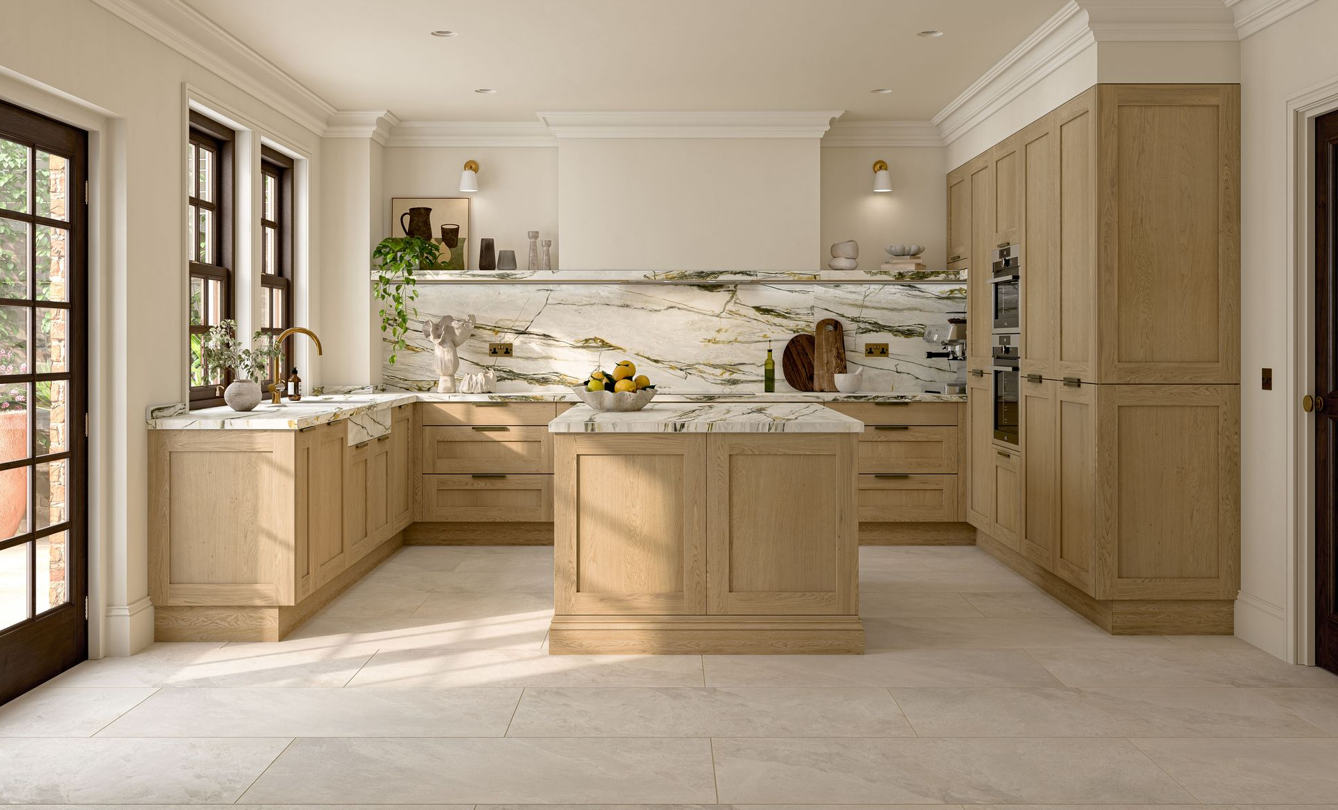 Modern open-plan kitchen and dining area with cream cabinetry, a central island, and a circular wooden dining table.
