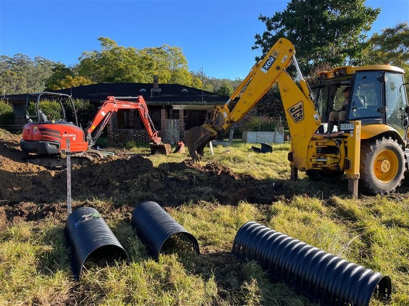 Two Excavators Working Outside — Tim Larkin Plumbing and Excavations in Laurieton, NSW