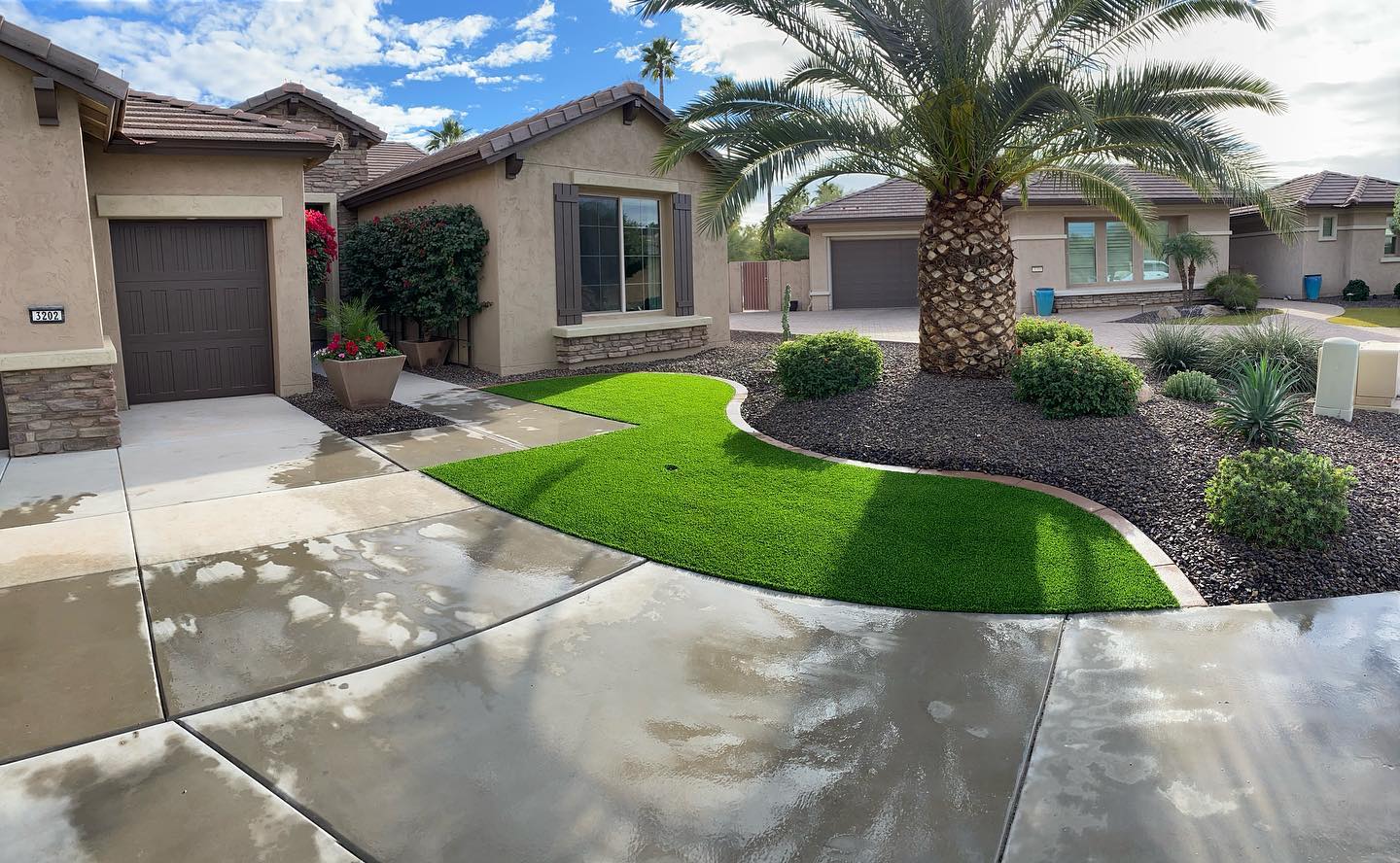 A newly upgraded landscape in Gilbert, AZ with an artificial lawn