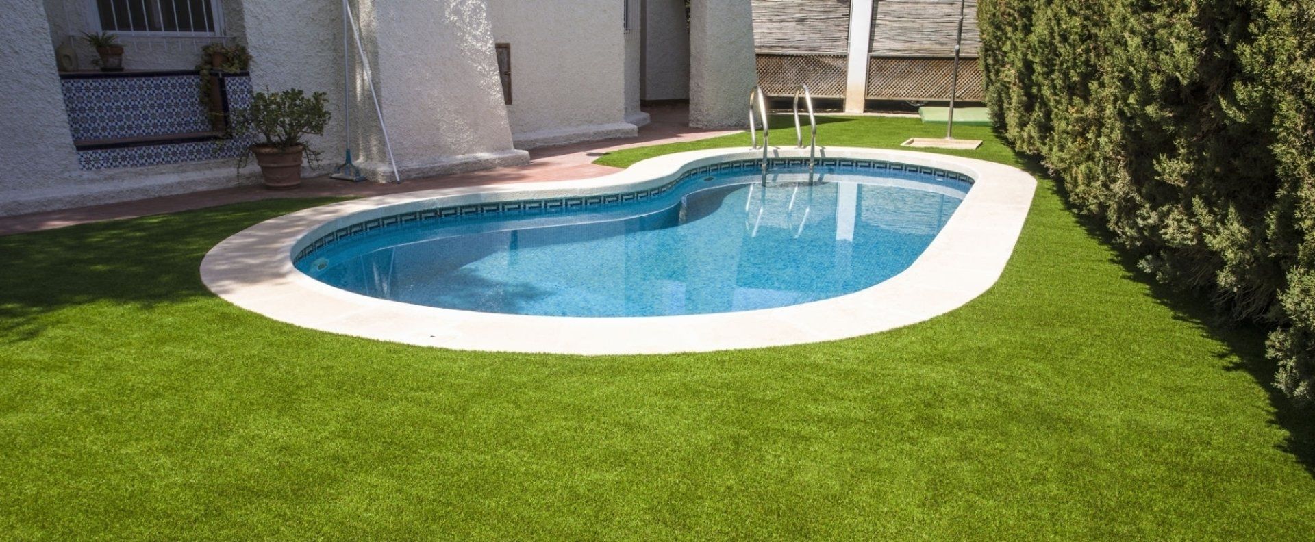 artificial grass around a pool in Chandler AZ