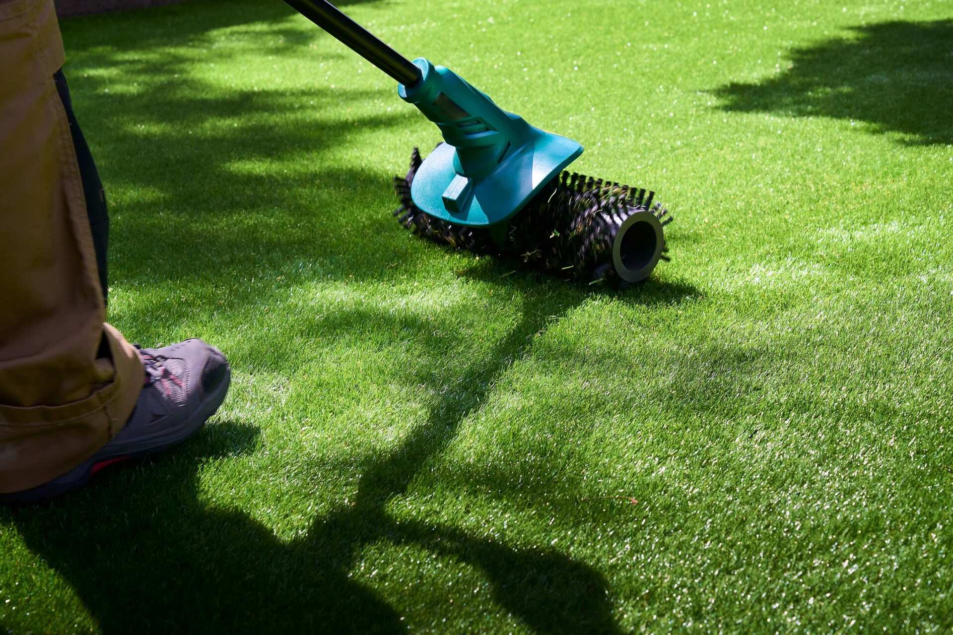 electric brush is used for periodic artificial grass cleaning and maintenance