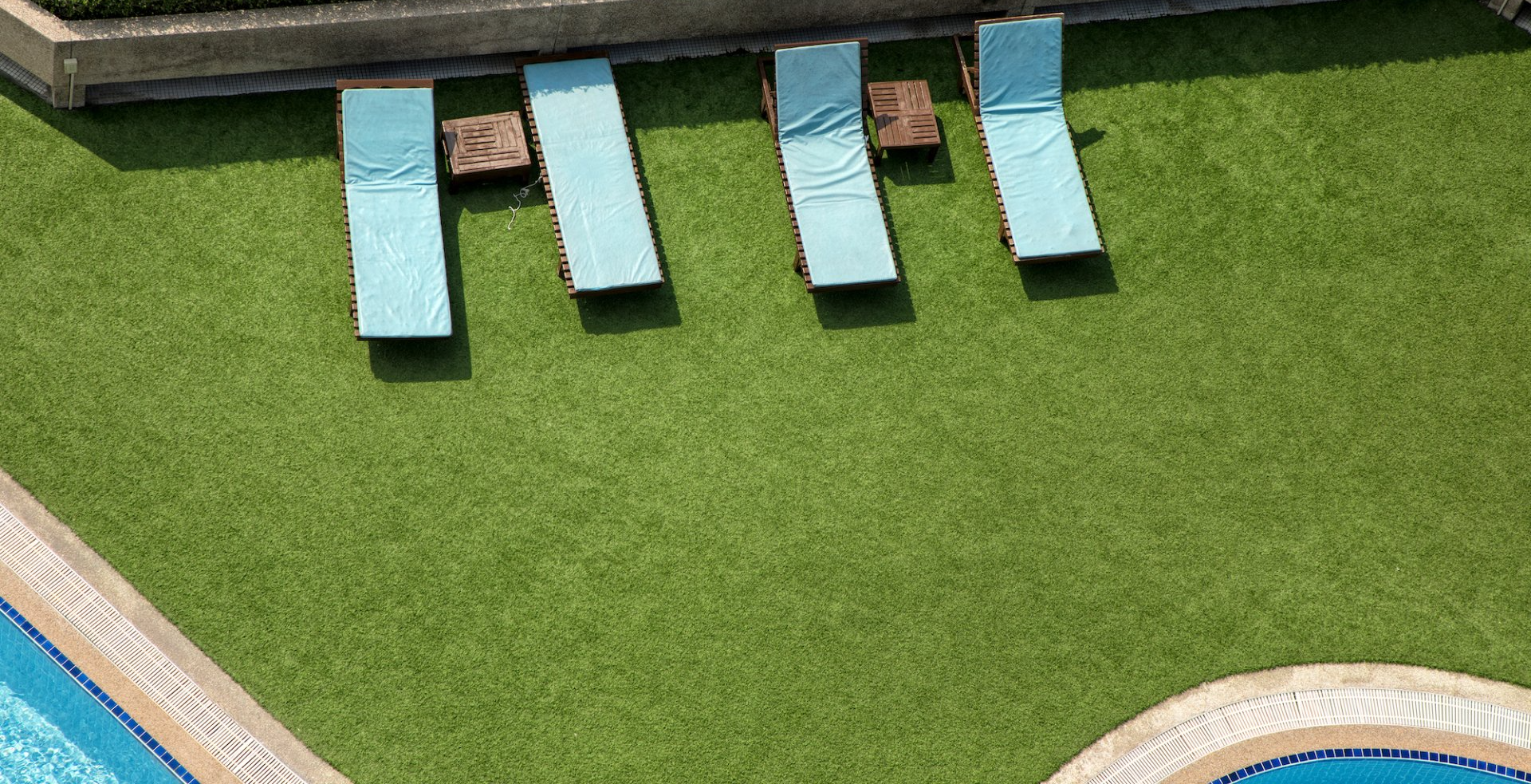 backyard lawn that also serves as pool deck in Chandler, AZ
