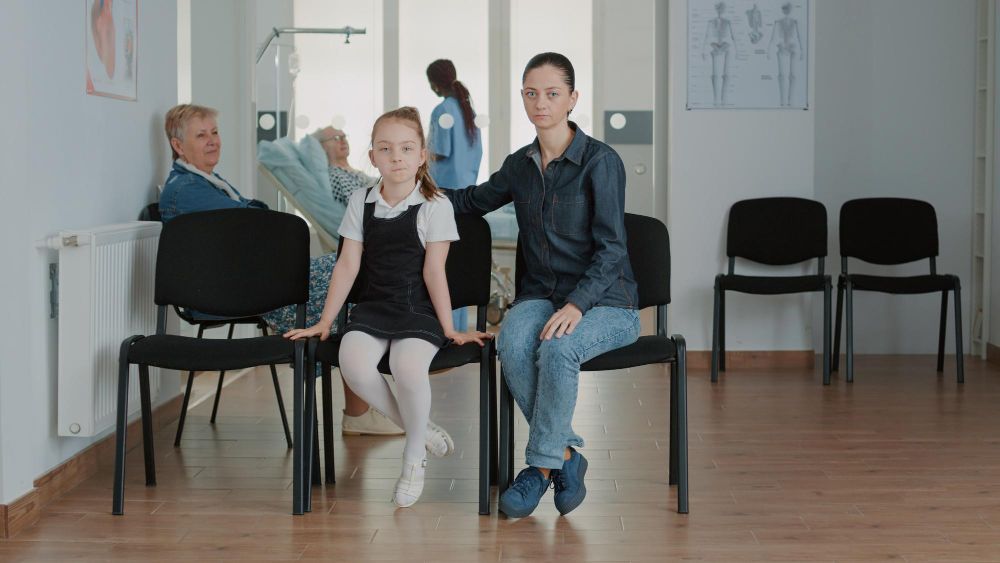 Mother and daughter waiting for an adhd/autism assessment