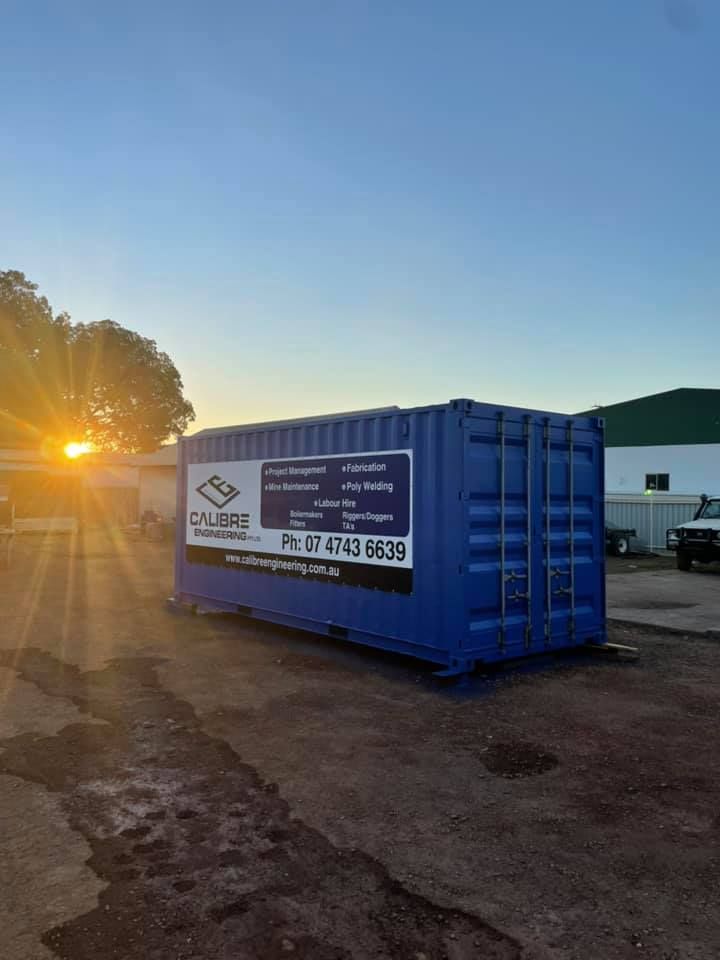 Blue Shipping Container Parked In A Dirt Lot — Calibre Engineering In Mica Creak, QLD