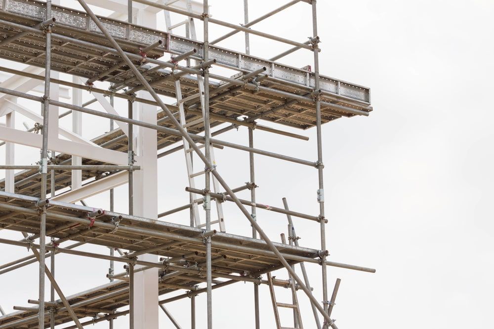 Building Being Built With Scaffolding And A Ladder — Calibre Engineering In Mica Creak, QLD