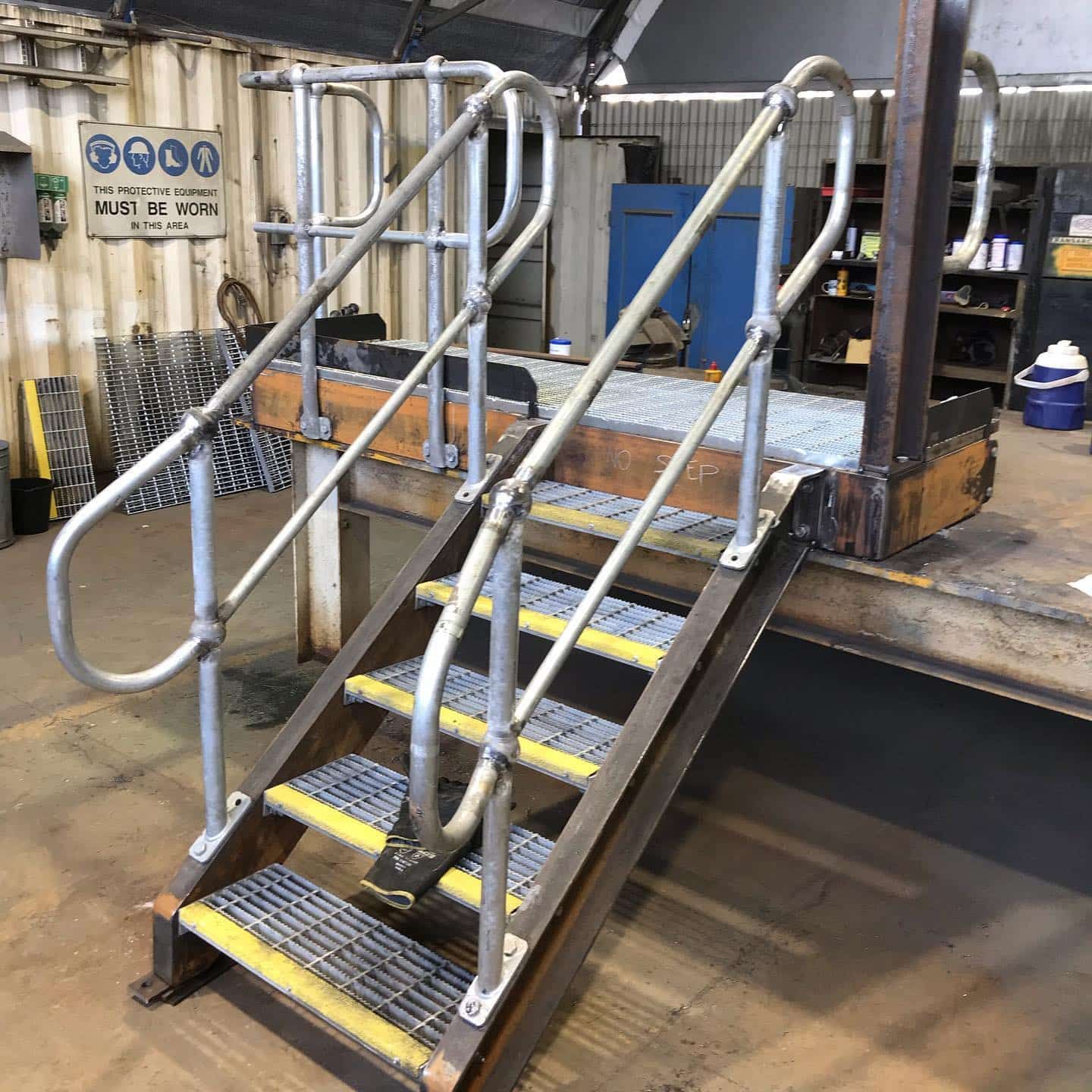 Set Of Stairs With A Metal Railing In A Factory — Calibre Engineering In Mica Creak, QLD