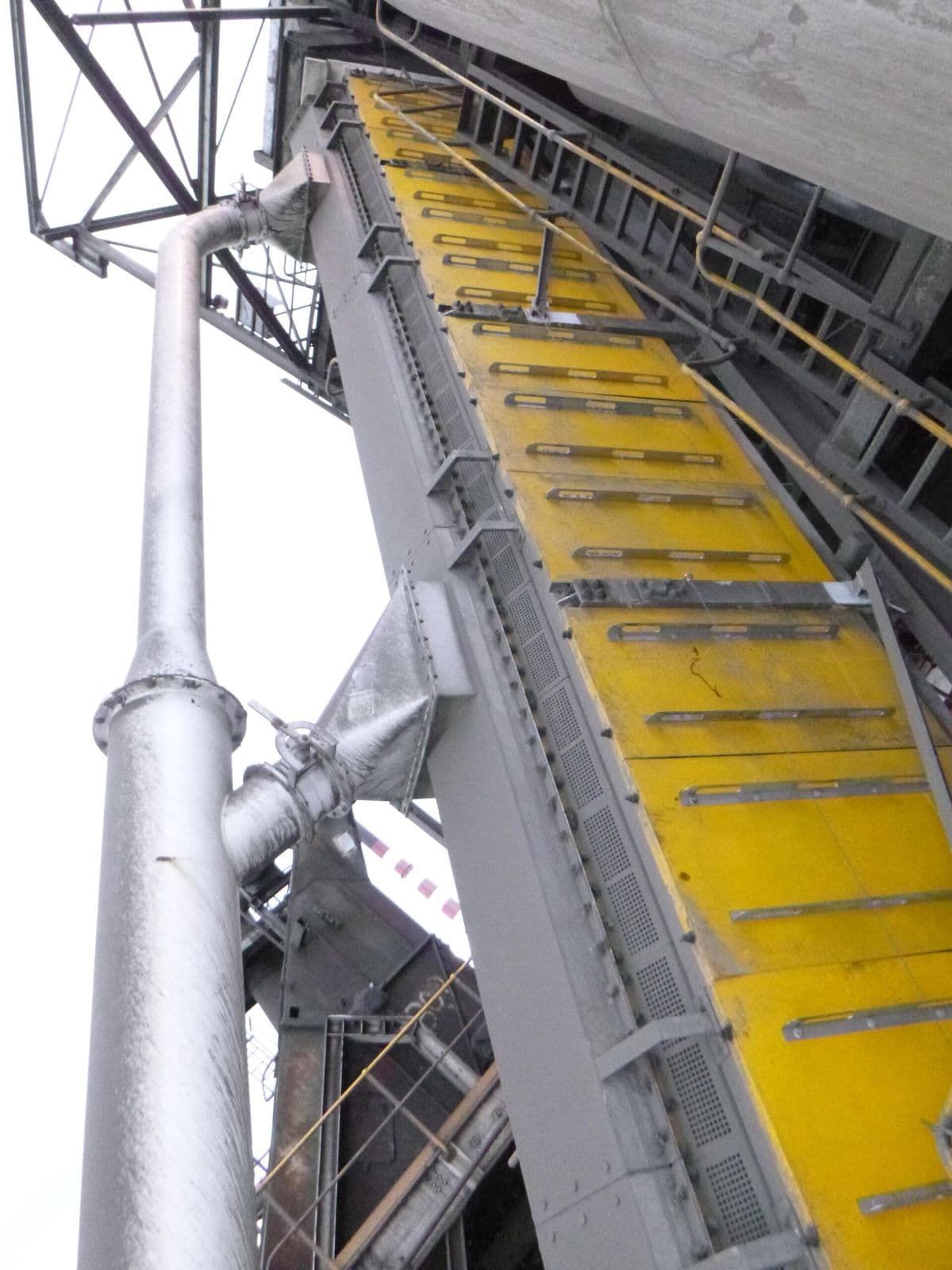 Yellow Conveyor Belt Outside Of A Building — Calibre Engineering In Mica Creak, QLD