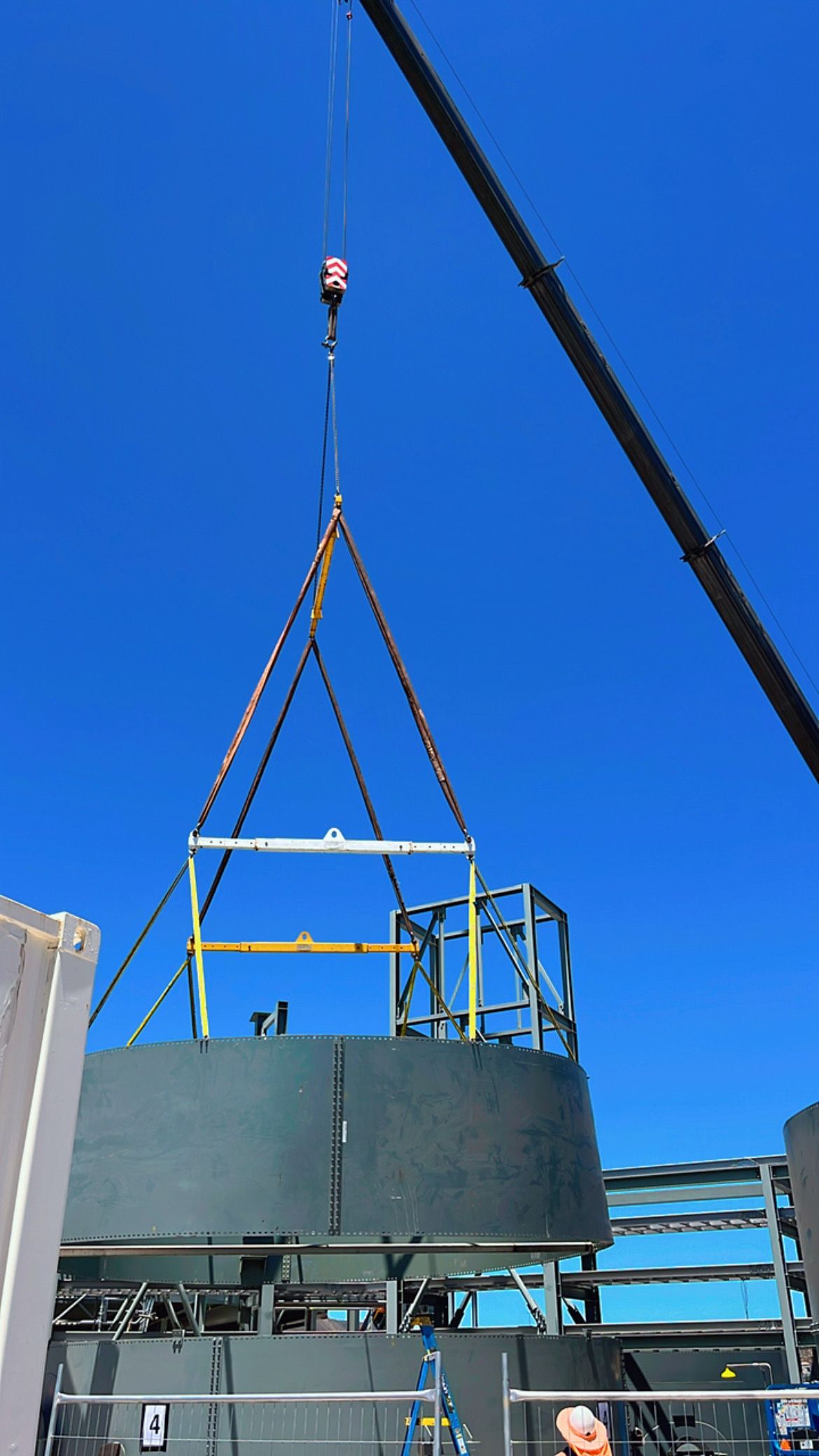 A crane is lifting a large object into the air — Calibre Engineering In Mica Creak, QLD