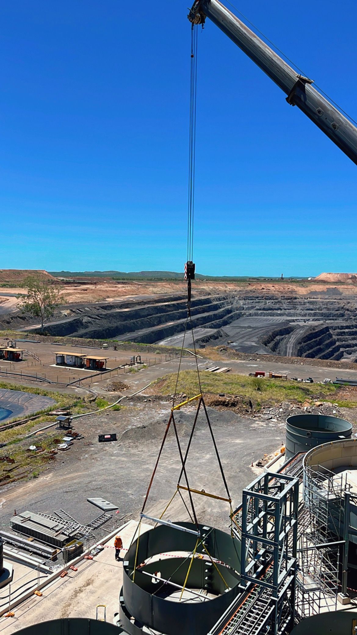 A large object is being lifted by a crane at a construction site — Calibre Engineering In Mica Creak, QLD
