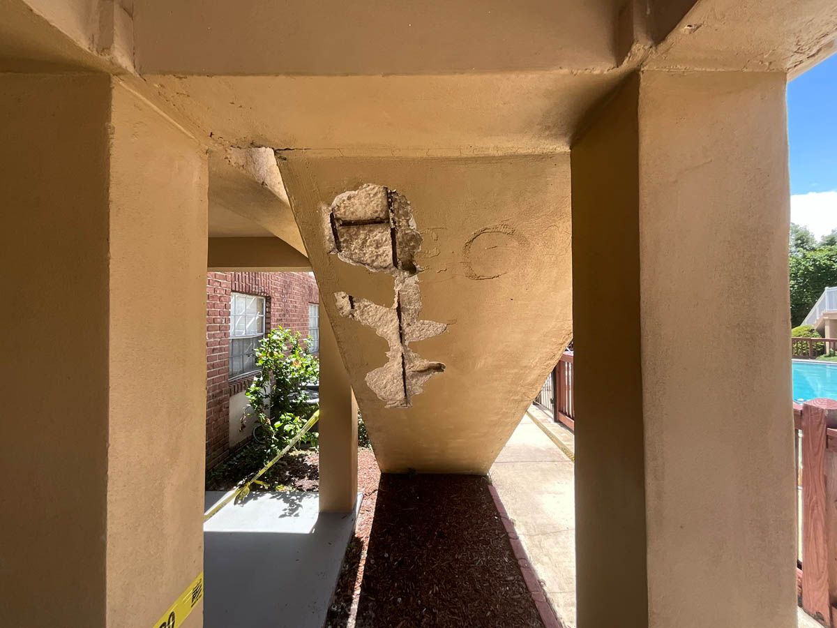 There is a hole in the ceiling of a building.