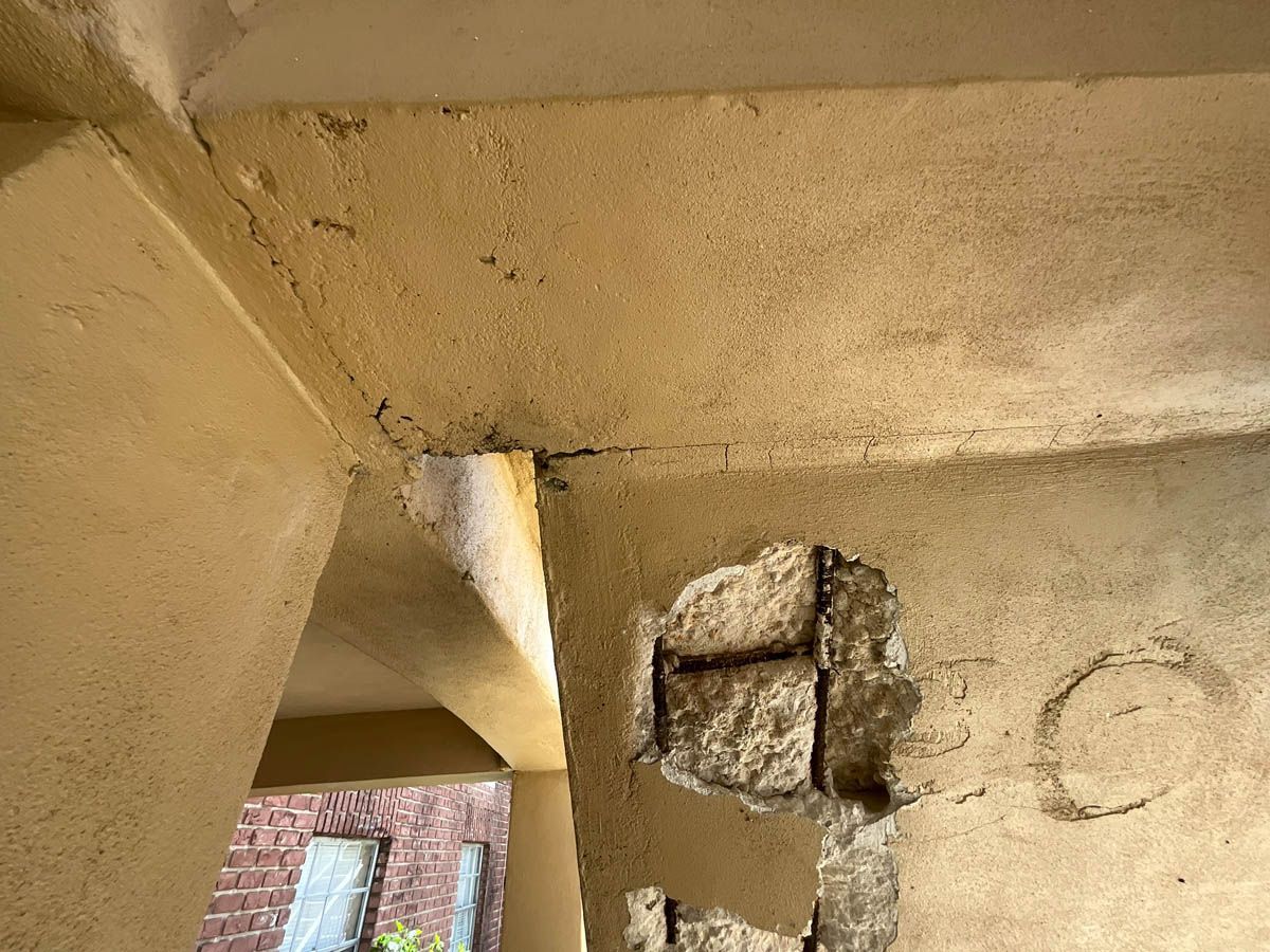 A close up of a wall with a hole in it.