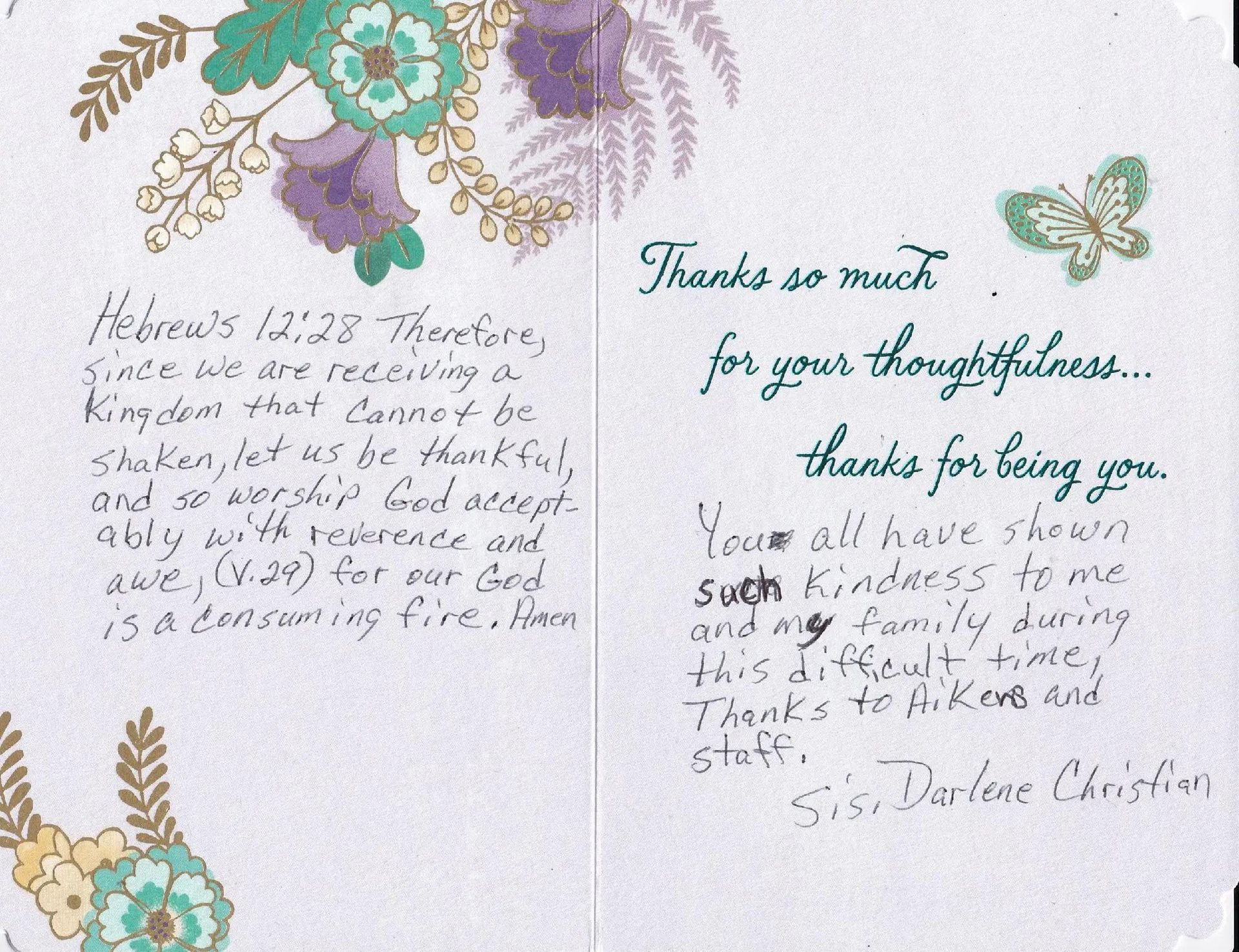 Card with floral decorations and handwritten message: 