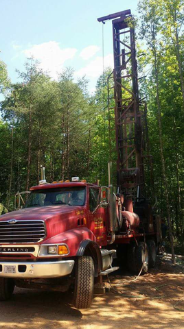Residential Irrigation Wells — Red Service Truck in Georgia