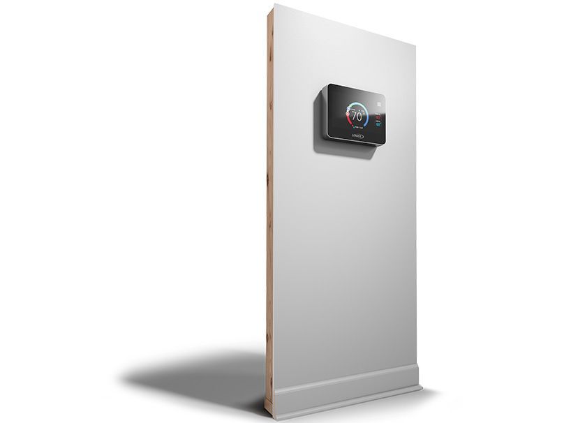 A white wall with a thermostat mounted on it.