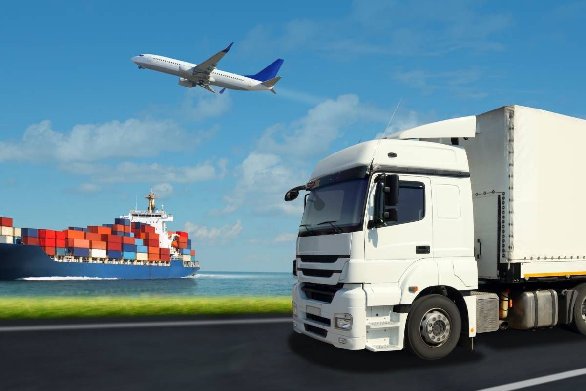 A truck, plane, and ship representing freight forwarding services near Nicholasville, Kentucky (KY)