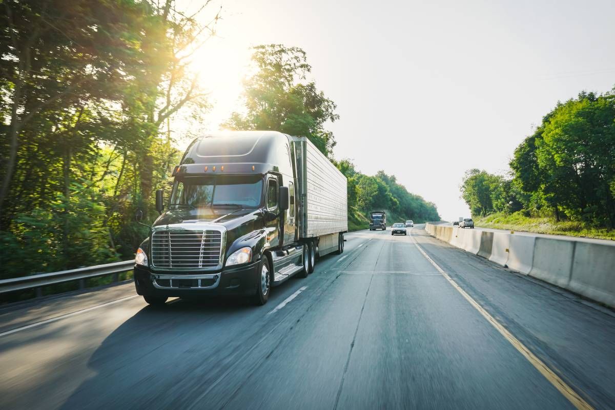 A semi-truck with domestic shipping on a highway near Nicholasville, Kentucky (KY)