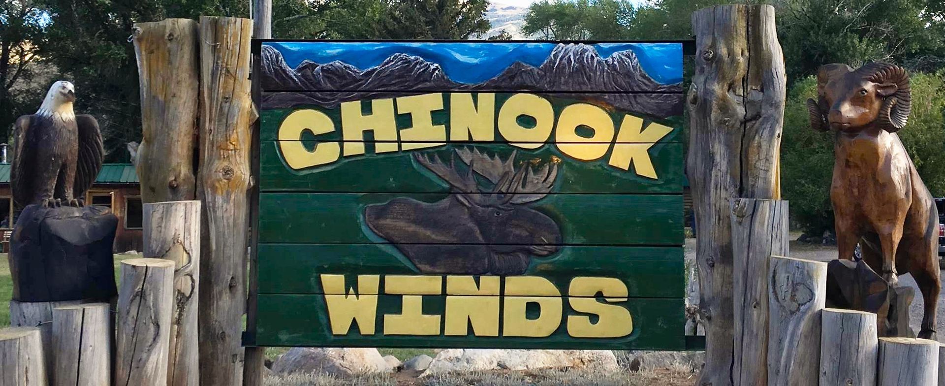 A wooden sign that says chinook winds on it