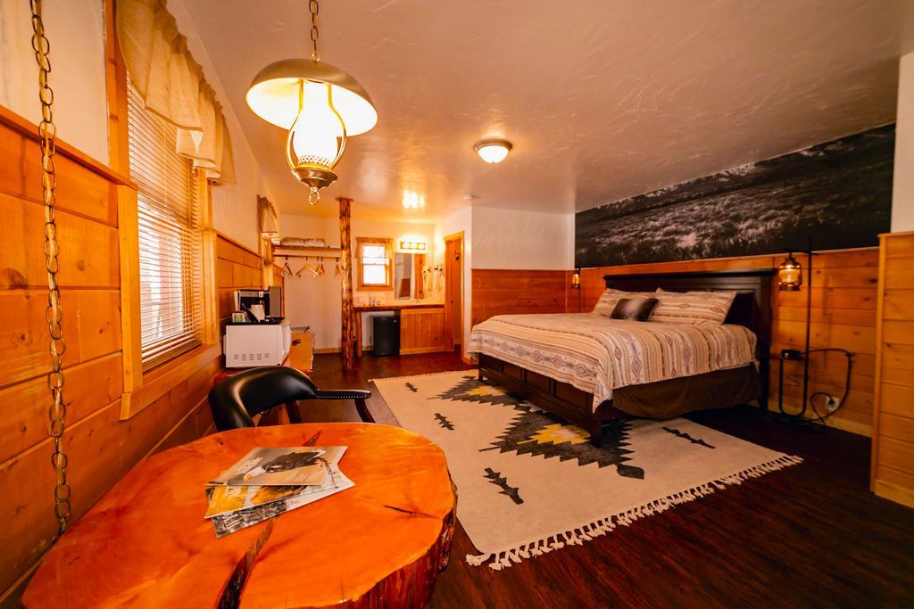 There is a large bed in the middle of the room.