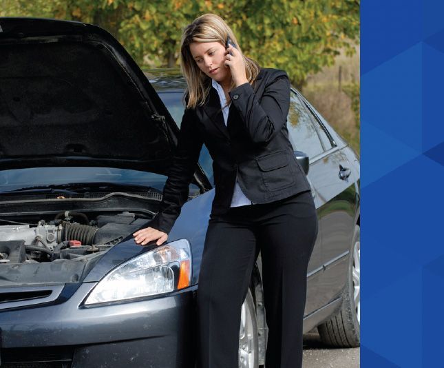 A person talking on the phone | McWilliams & Walden Inc.