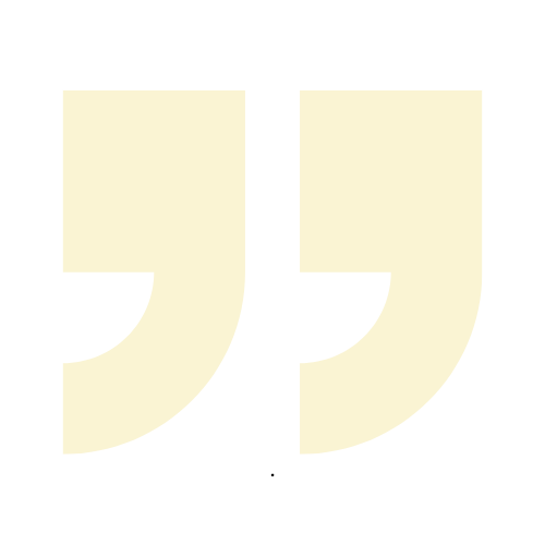 A pair of yellow quotation marks on a white background.