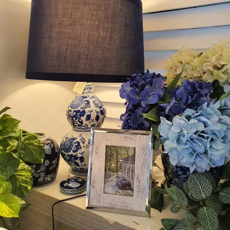 Picture Frame With Blue Cover Lamp And Blue Flowers Behind | Cleveland, QLD | Miraje Home Decor & Soft Furnishings