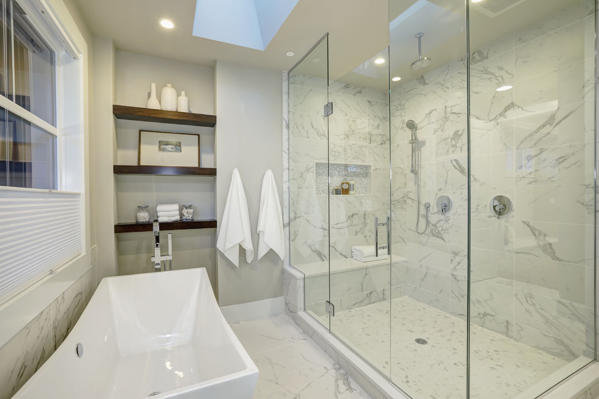 White and gray marble master bathroom