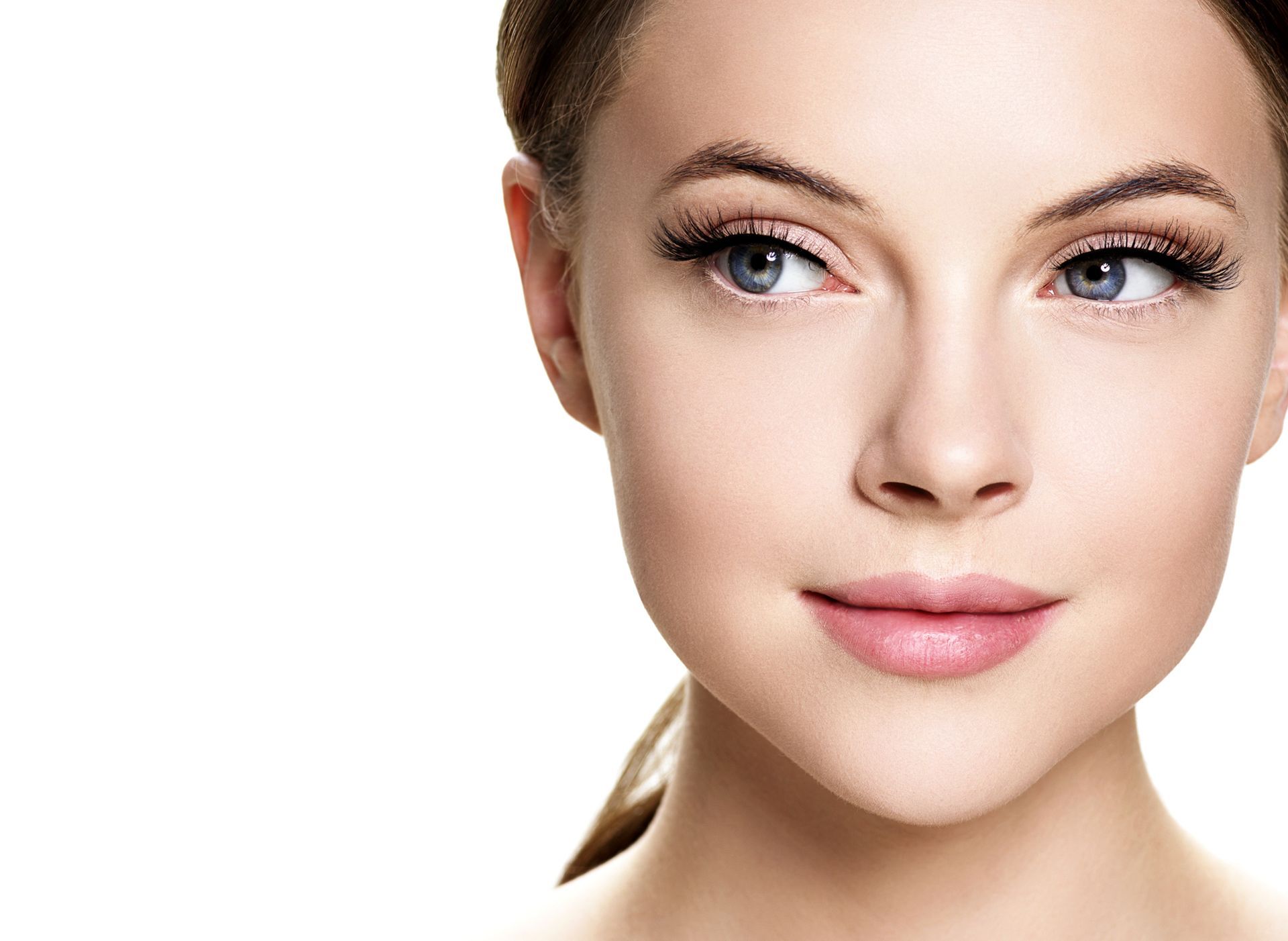 A close up of a woman 's face on a white background.