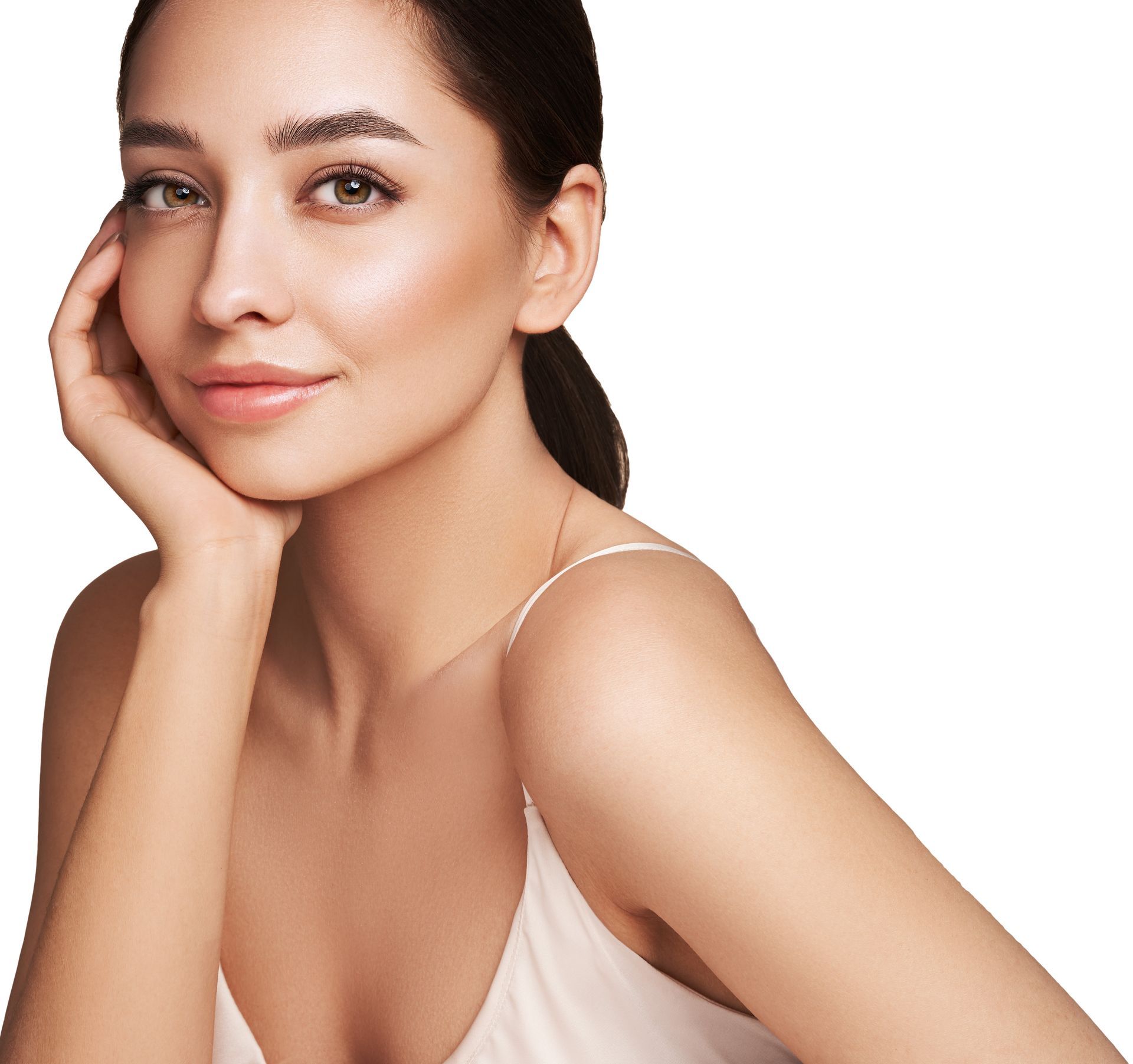 A woman in a white tank top has her hand on her face