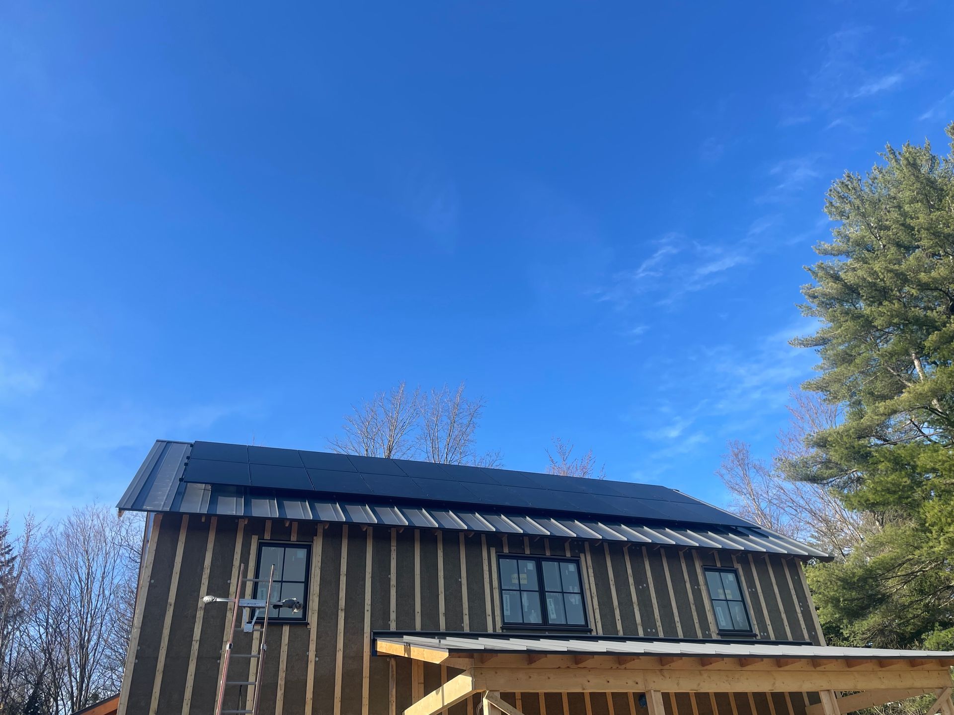 Residential roof with solar panles