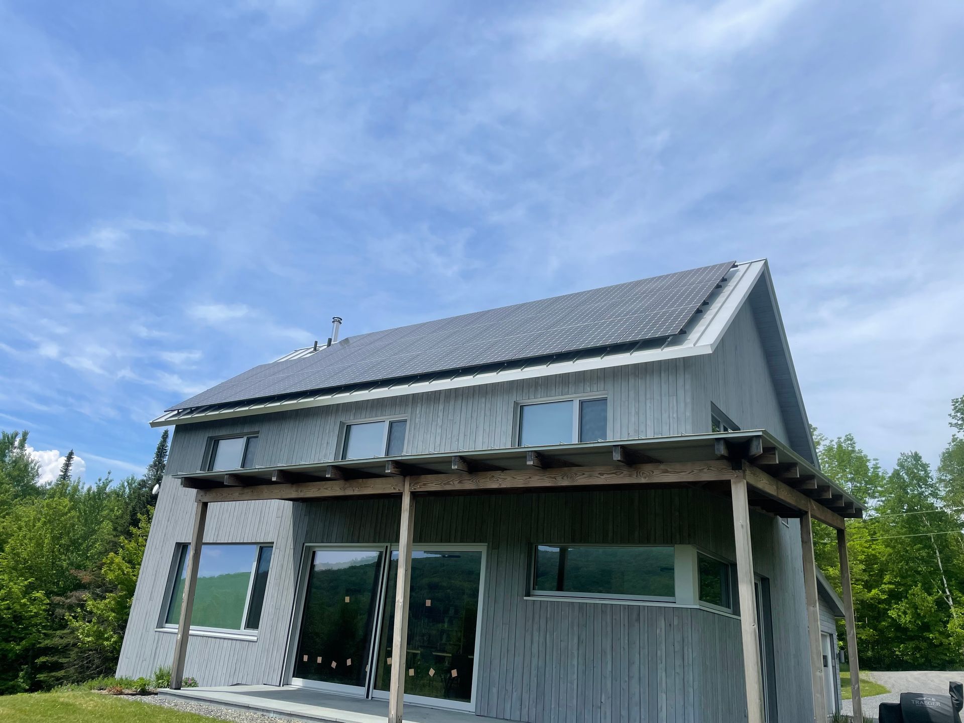 Residential home with solar panels installed on the roof