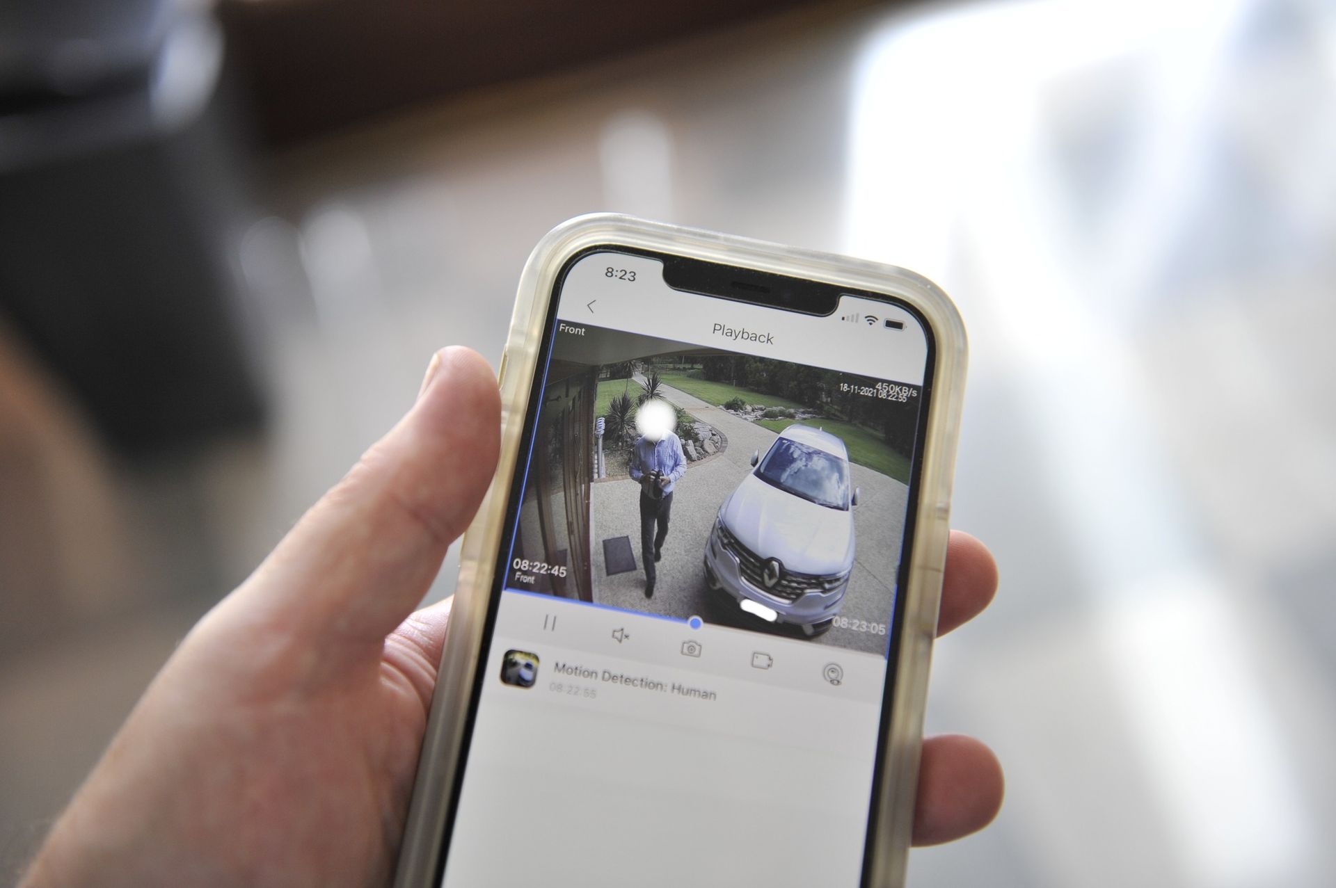 A Person is Holding a Cell Phone With a Picture of a Car on the Screen — Brisbane Antenna Specialists in Brendale, QLD