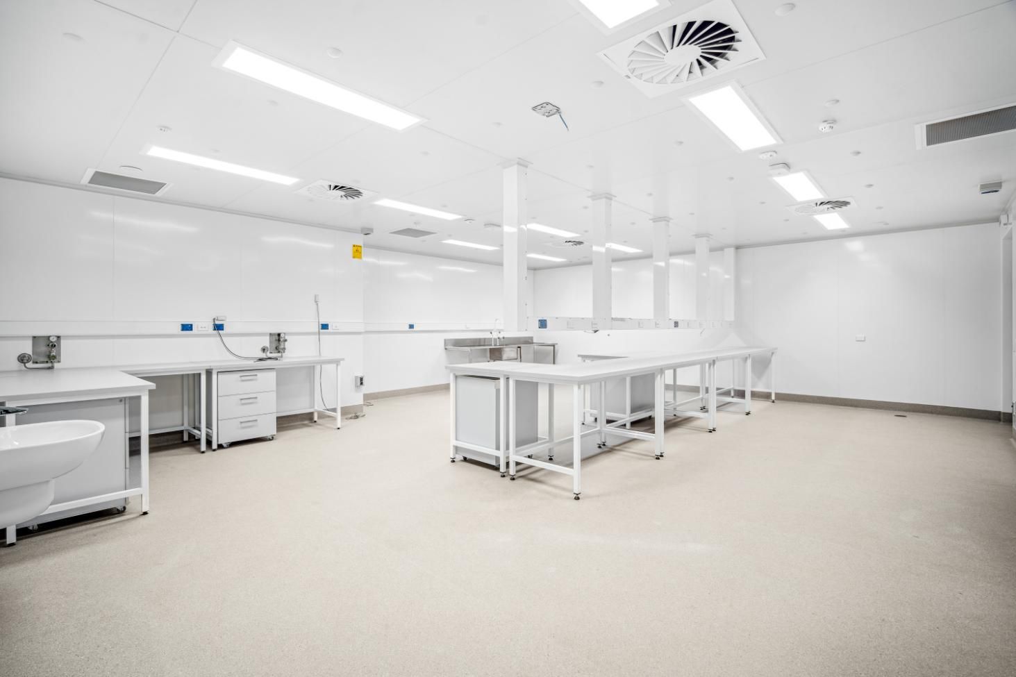 A Clean, White Laboratory With Workstations — Arctic Installations in Winnellie, NT