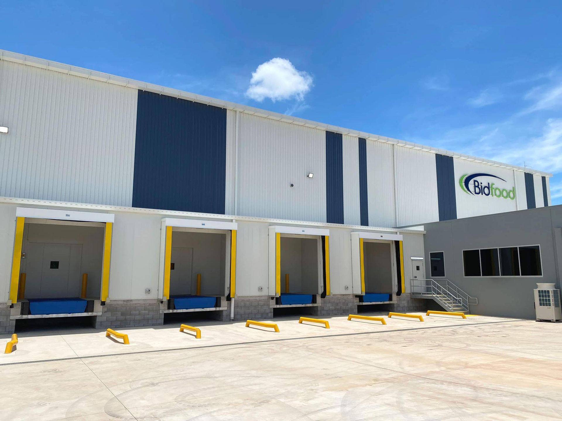 A Row of Empty Shelves in A Warehouse — Arctic Installations in Winnellie, NT