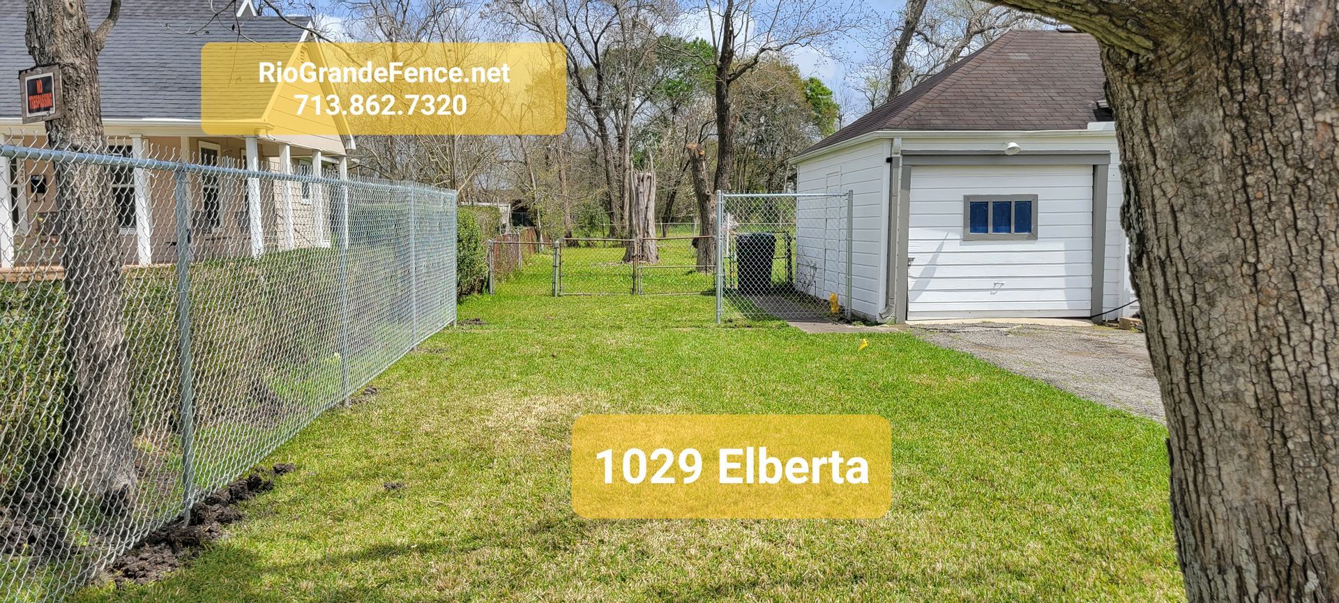 A Chain Link Fence Surrounds a Yard with A Garage and A House in The Background - Houston, TX - Rio Grande Fence Company