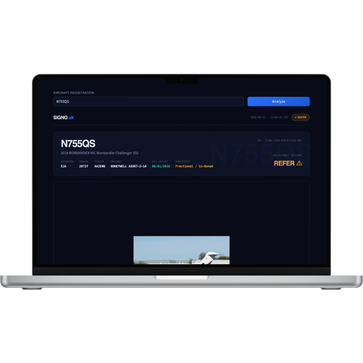 A laptop computer is open to a website.