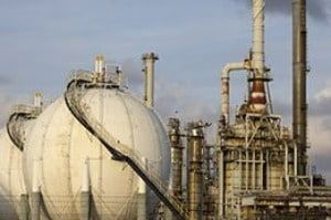 A large industrial plant with a lot of pipes and tanks.