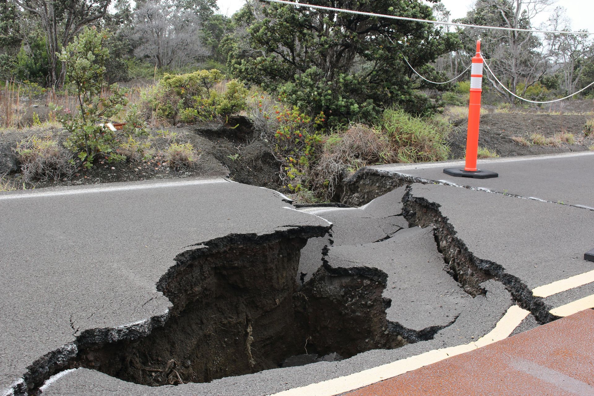 A large hole in the middle of a road
