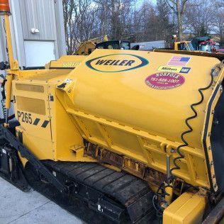 The asphalt paving machine in Canton MA used by Norfolk Asphalt Paving & Excavation