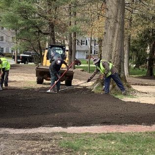 A residential driveway installation in Canton MA - Norfolk Asphalt Paving & Excavation hard at work
