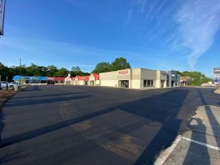An after shot of an commercial asphalt parking lot in Canton, MA by Norfolk Asphalt Paving & Excavation 