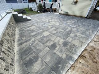 A paved residential walkway in Canton MA by Norfolk Asphalt Paving & Excavation