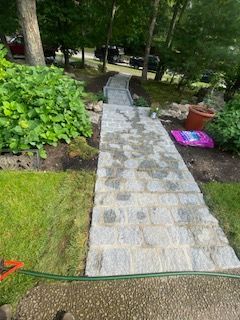 A custom paved walkway in Canton MA by Norfolk Asphalt Paving & Excavation